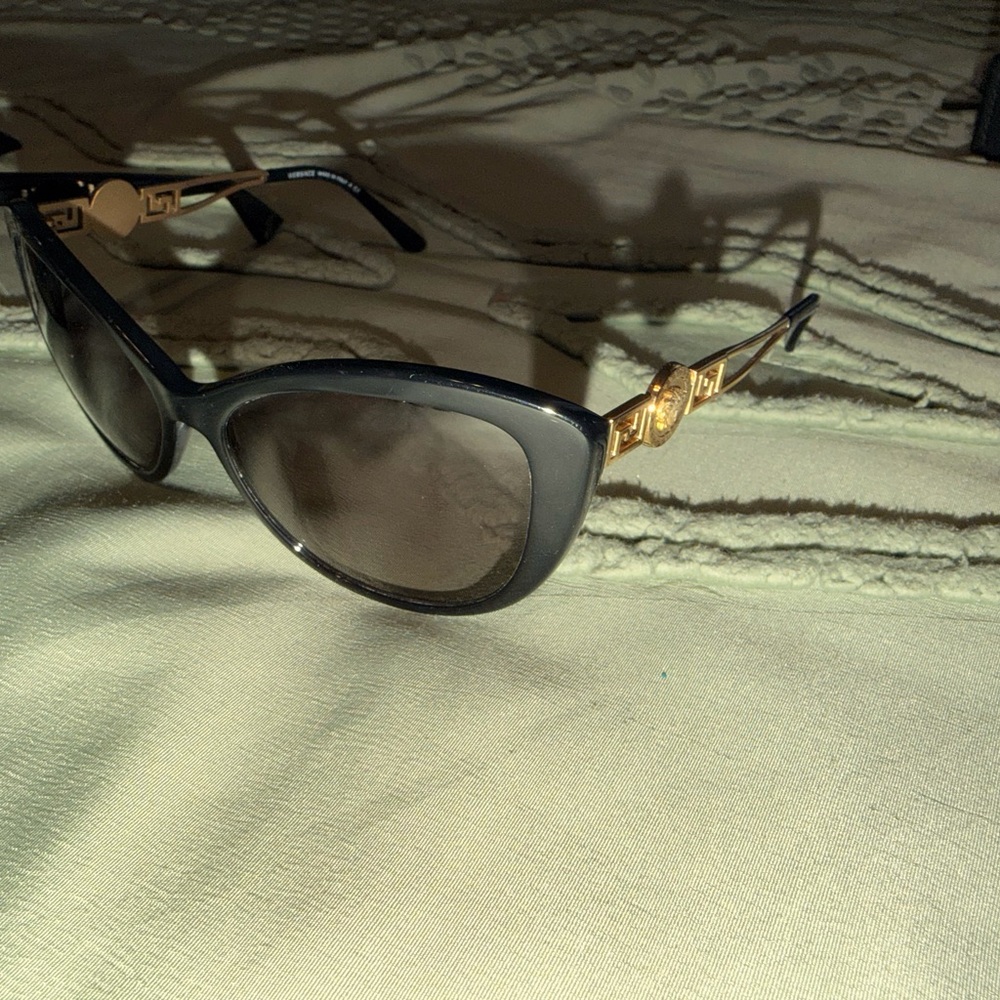 Elegant Black and Gold Sunglasses